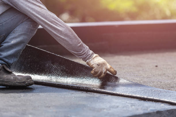 Professional Emergency Waterproofing technician working in Frankfort, MI